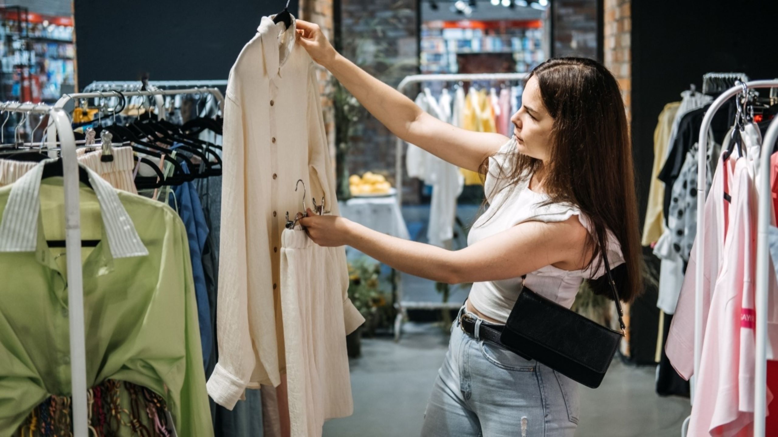 Woman shopping in luxury sustainable fashion boutique ethical fashion sustainable boutiques luxury eco