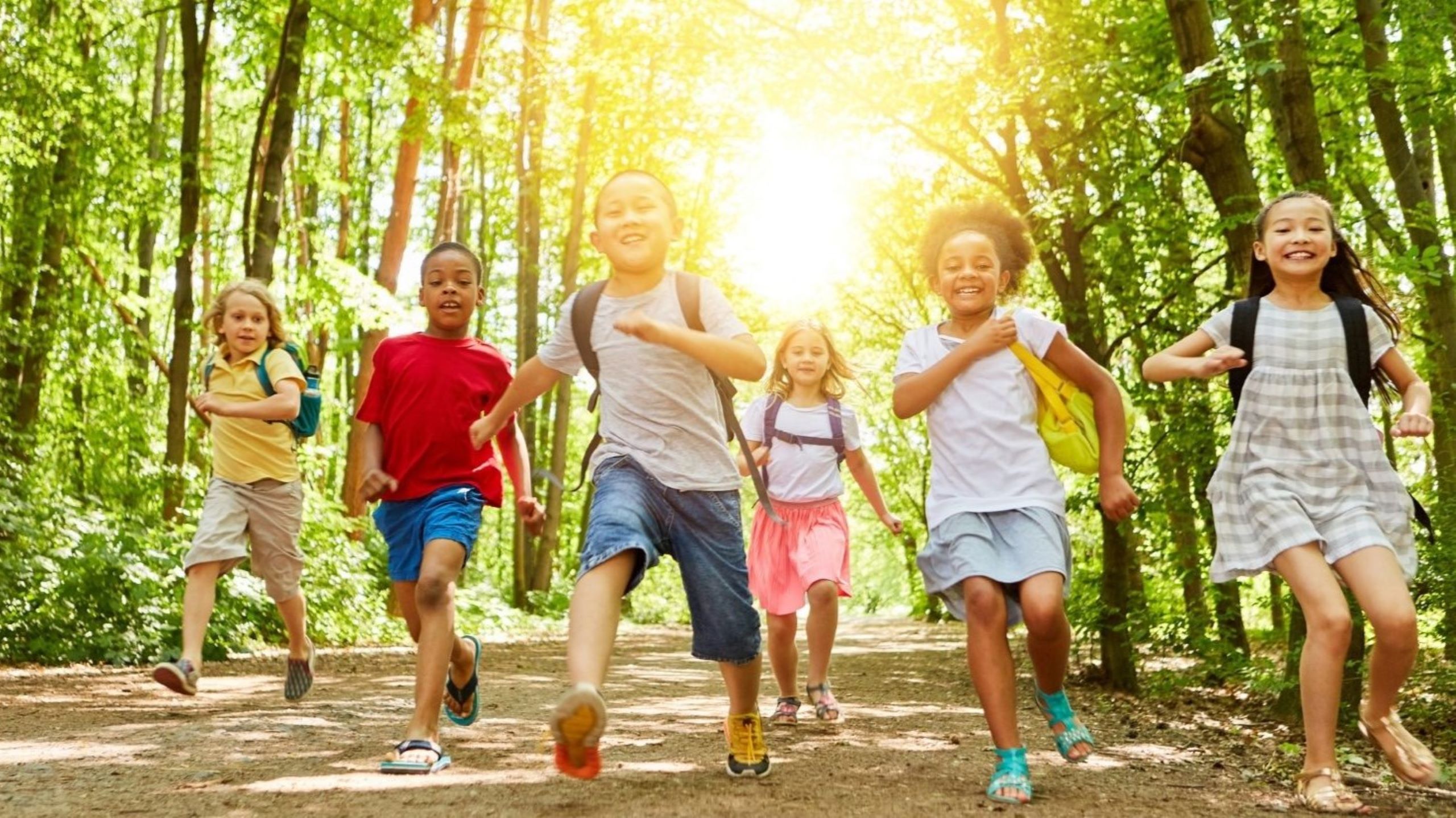 Children enjoying outdoor school holiday activities at Dubai camp with sports and adventure programs, representing engaging winter break options for families during December 2025 extended holidays