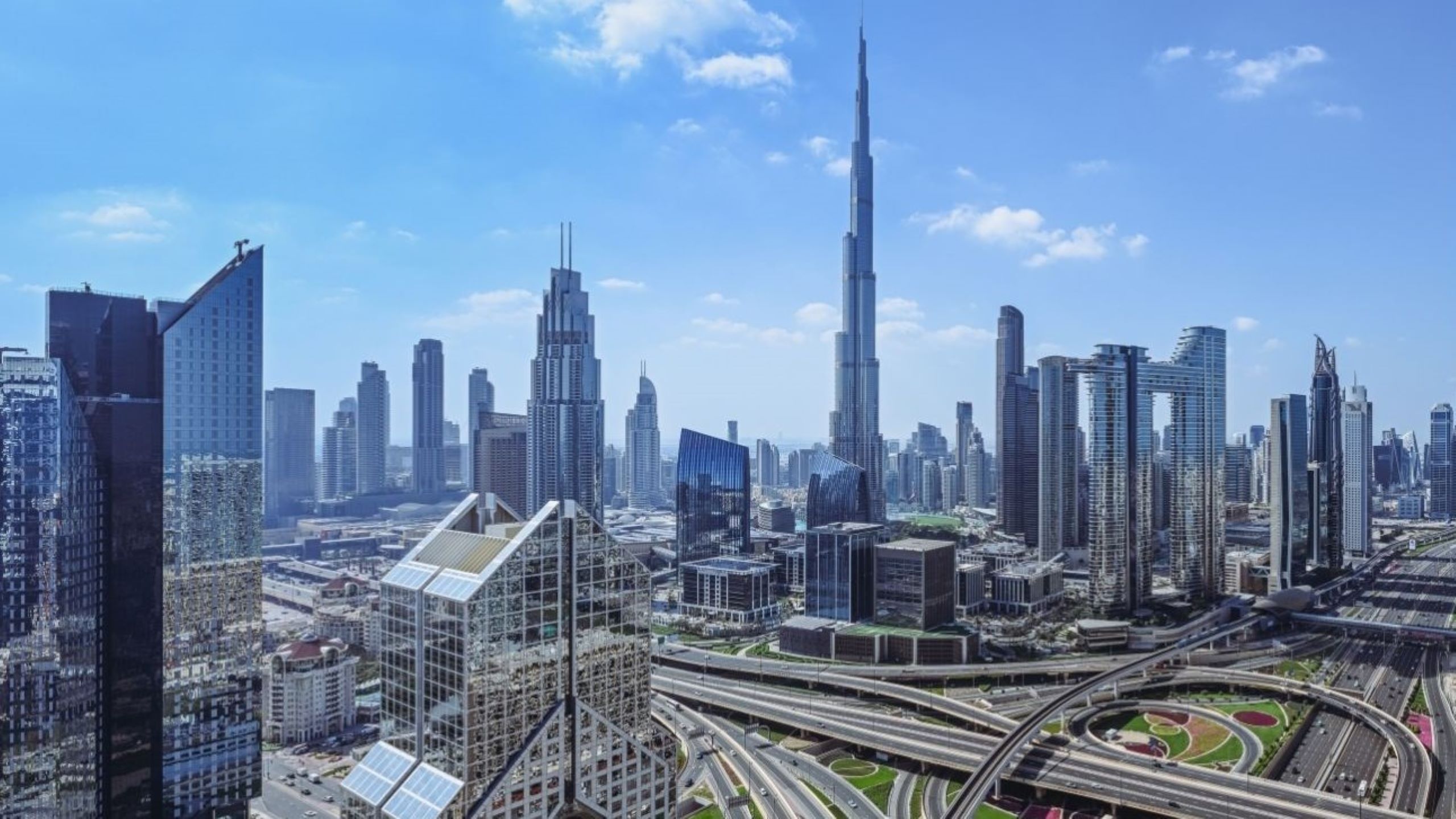 Economic forecast 2026 Dubai showing GDP growth with iconic skyline and investment opportunities