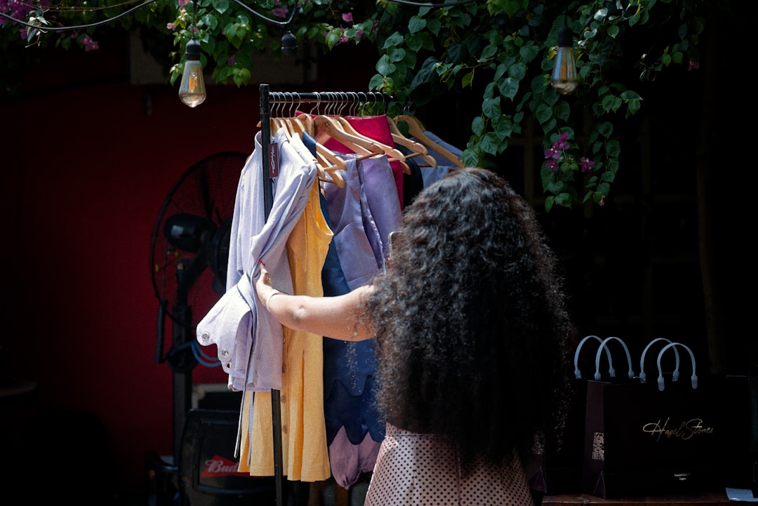 A woman wearing a breathable linen outfit that forms the core of a capsule wardrobe for Dubai summer heat