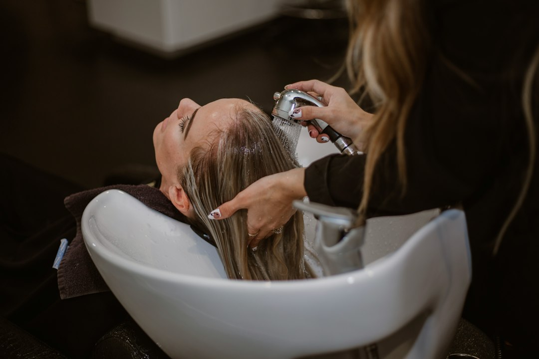 Client relaxing at one of Dubai's blow-dry bars during a styling session